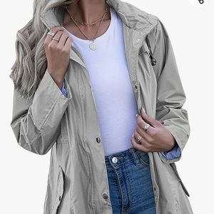 Raincoat with drawstring waist